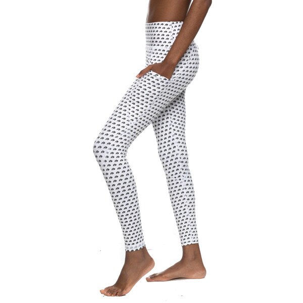 White leggings with mini buffalo logos all over and pockets on either side of the thigh..